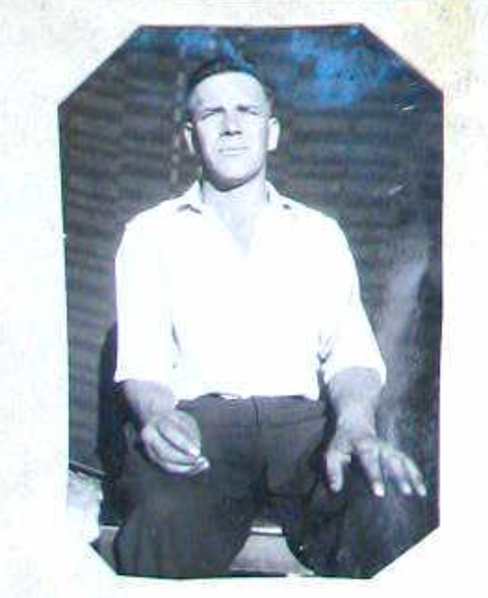 Old black and white photo of Carl Berg sitting on a chair